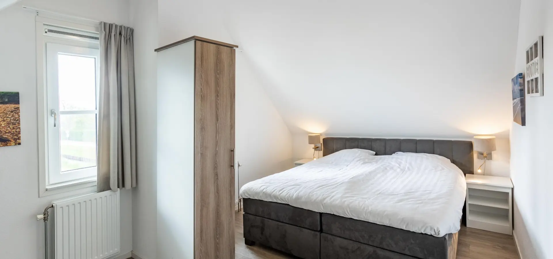 Slaapkamer 1 op eerste verdieping met 2-persoons boxspring