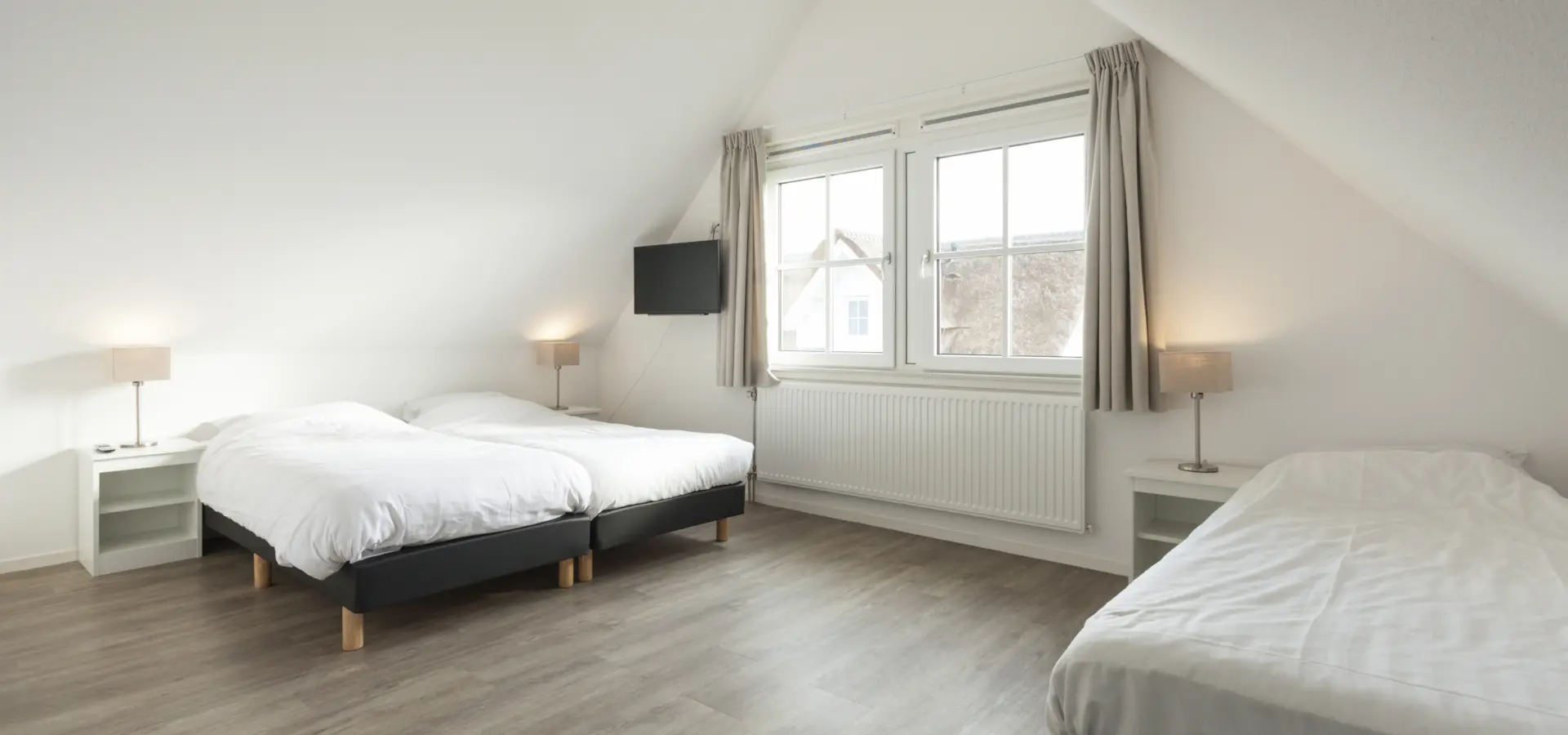 slaapkamer boven 3 bedden